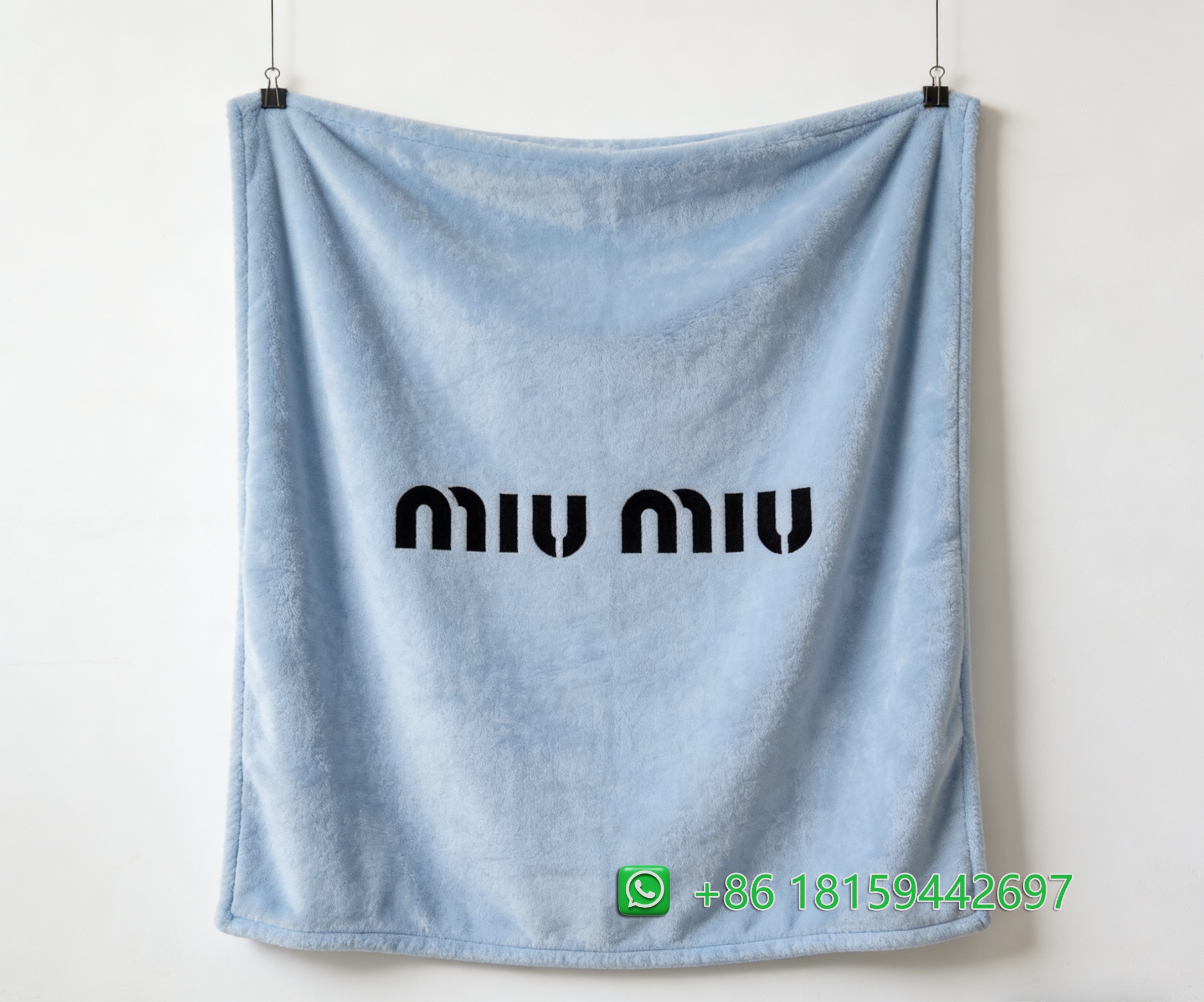 Miumiu Throw Blankets